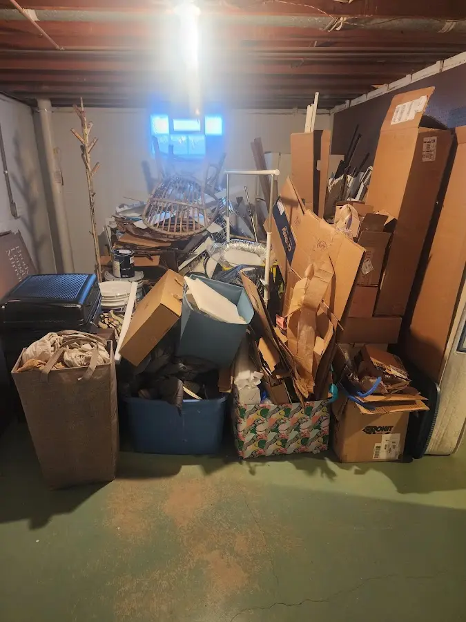 Roll-off dumpster container at job site for 2 Yard Dumpster Rental in Rosedale